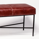Banqueta Cuero Caoba, Estructura hierro X. Medidas 120 x 40 x 45 cms.