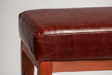 Banqueta Cuero Caoba y Madera Nativa, medidas 120 x 40 x 45 cms.