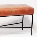 Banqueta Cuero Suela, Estructura hierro X. Medidas 120 x 40 x 45 cms.